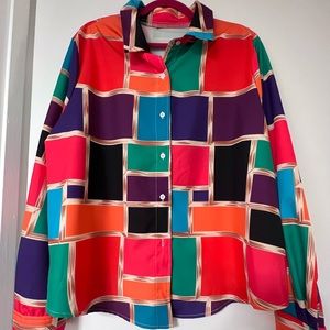 Beautiful, colorful blouse for work, hanging out.